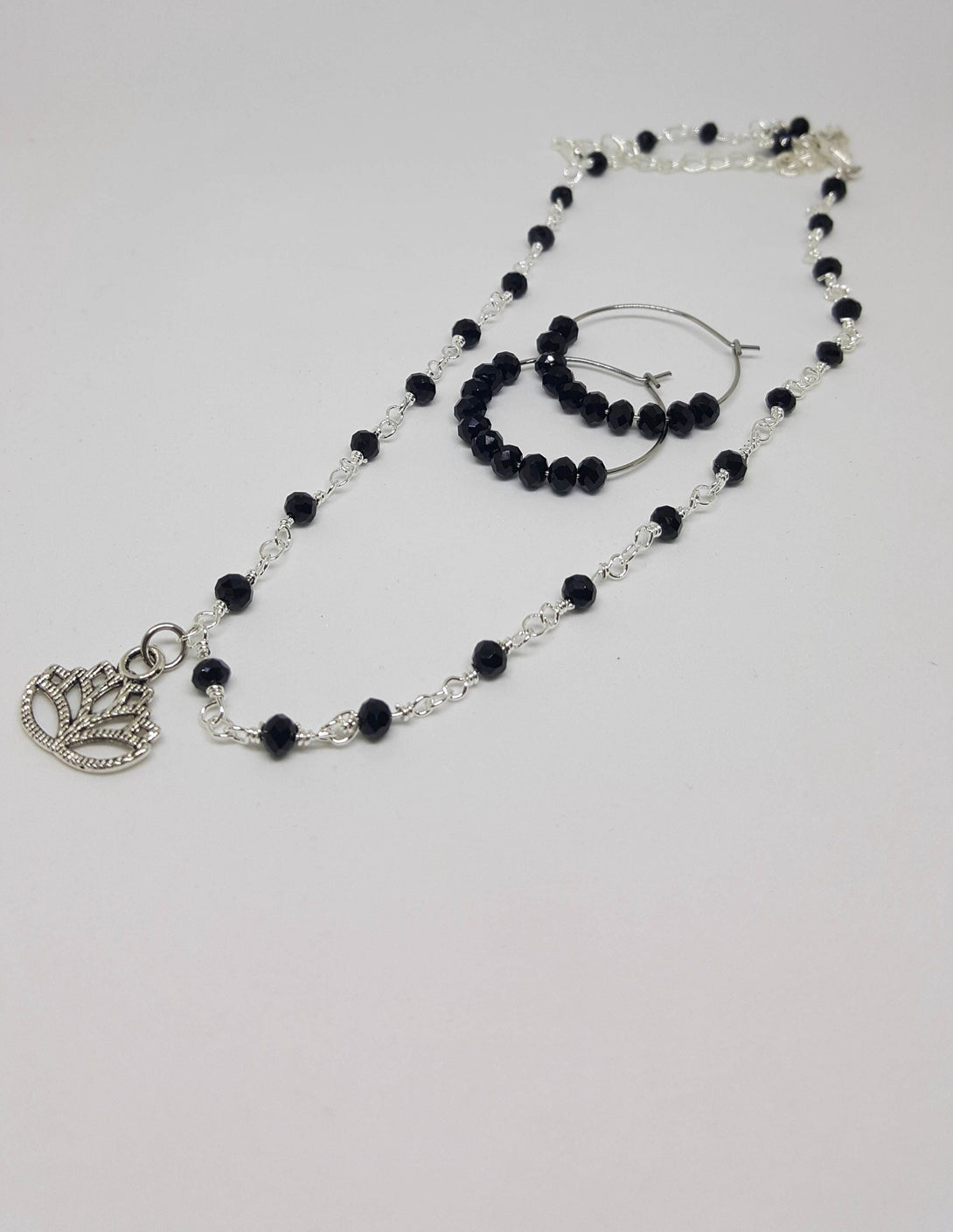 Onyx Bead Necklace With Lotus Charm, Inspirational Jewellery