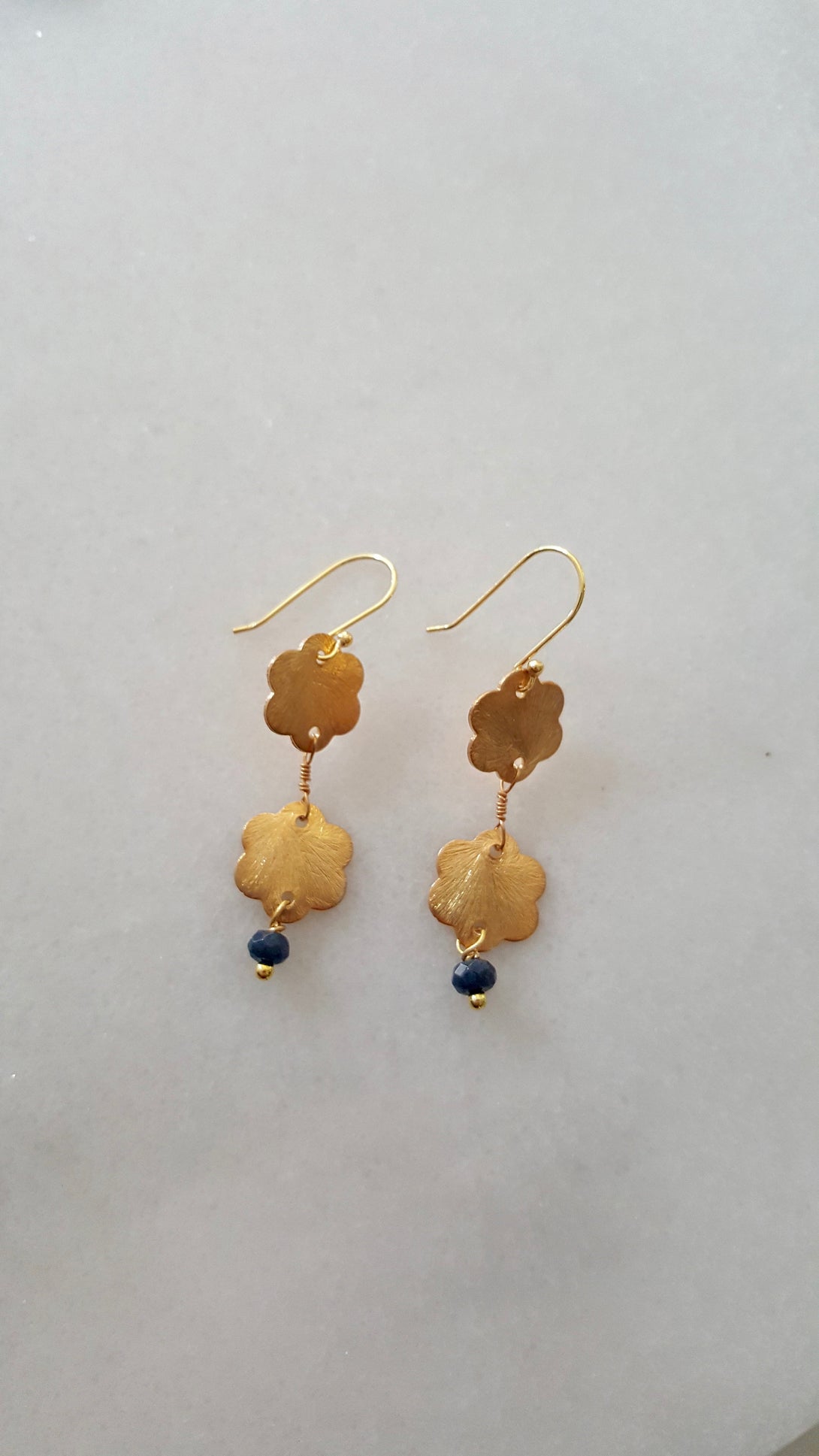 Hammered Metal Gold Flower And Sapphire Drop Earrings, September Birthstone Jewellery