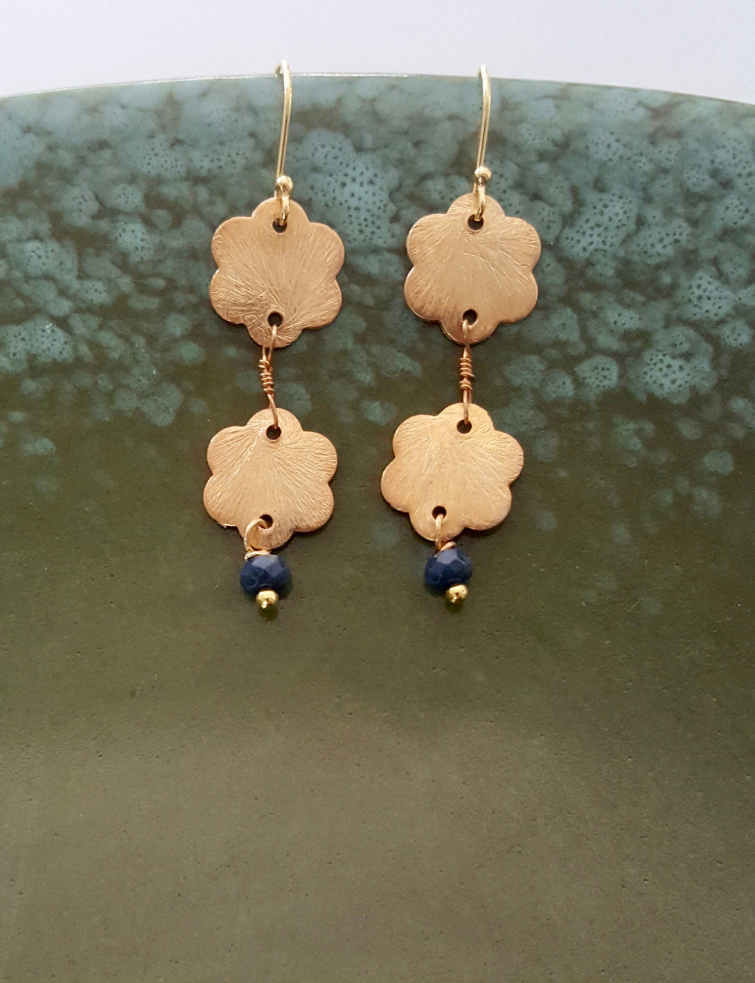 Hammered Metal Gold Flower And Sapphire Drop Earrings, September Birthstone Jewellery