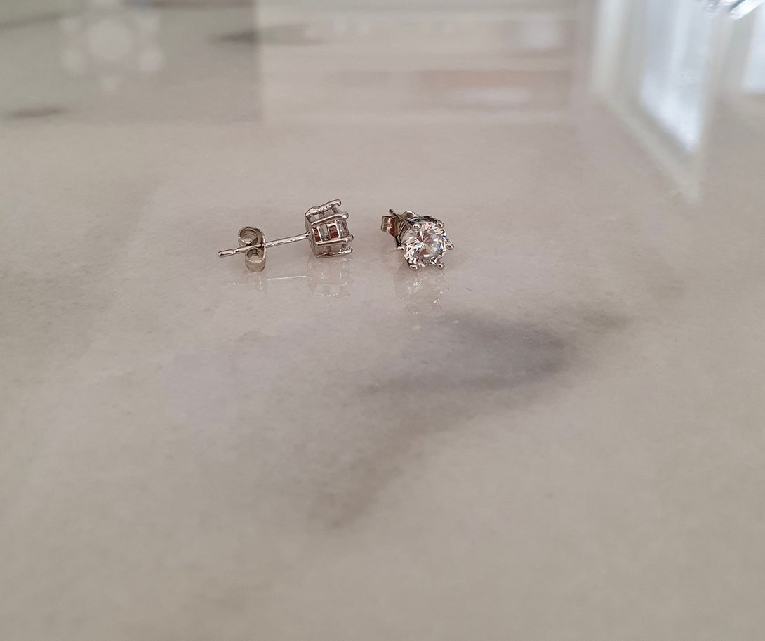 Solitaire Stud Earrings In Sterling Silver