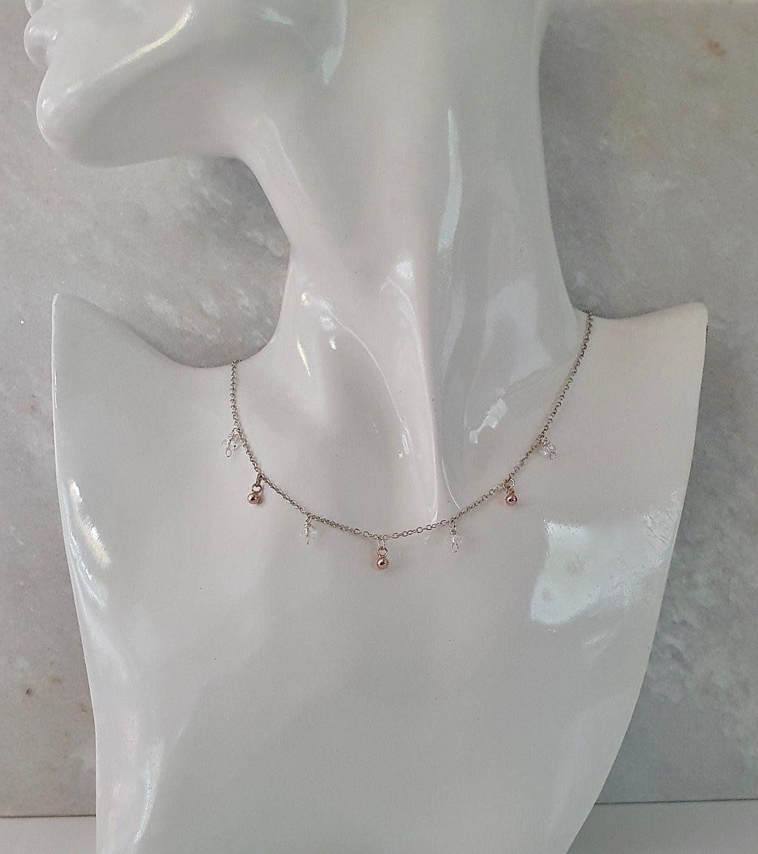 Clear Quartz And Rose Gold Charm Necklace, April Birthstone Jewellery