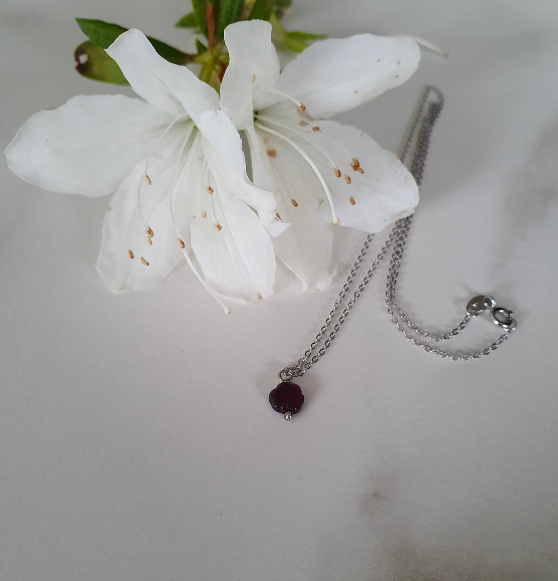 Tiny Garnet Flower Pendant Necklace, Symbolic And January Birthstone Jewellery