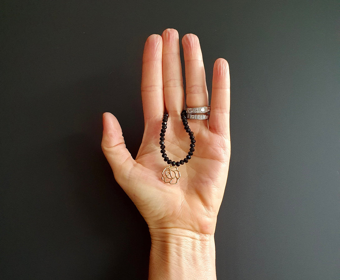 Onyx Bead Necklace With Camellia Charm, Protective And Symbolic December Birthstone Jewellery