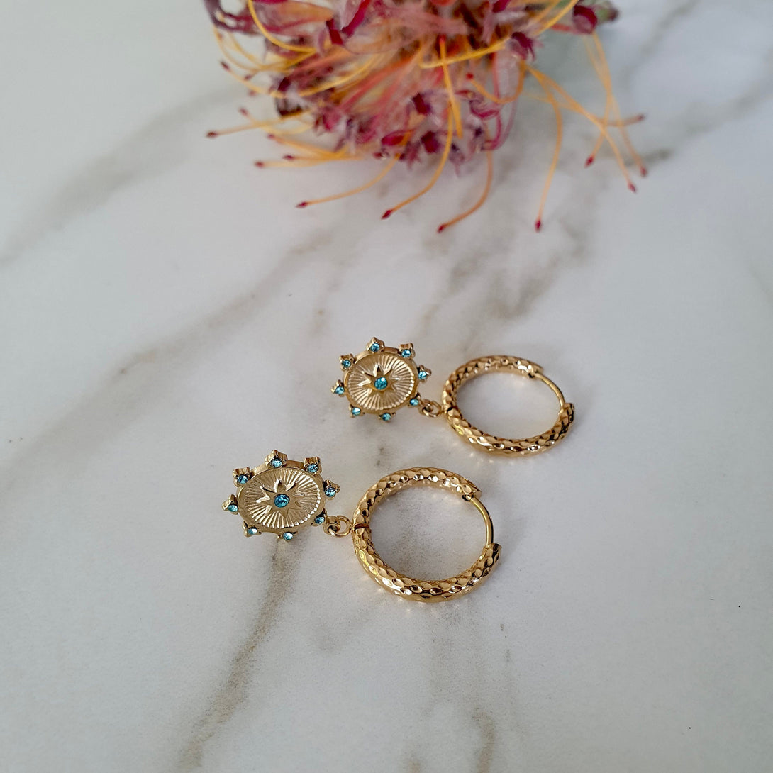 Gold Titanium Hoop Earrings With Turquoise Star Charms, Hypoallergenic Symbolic Jewellery