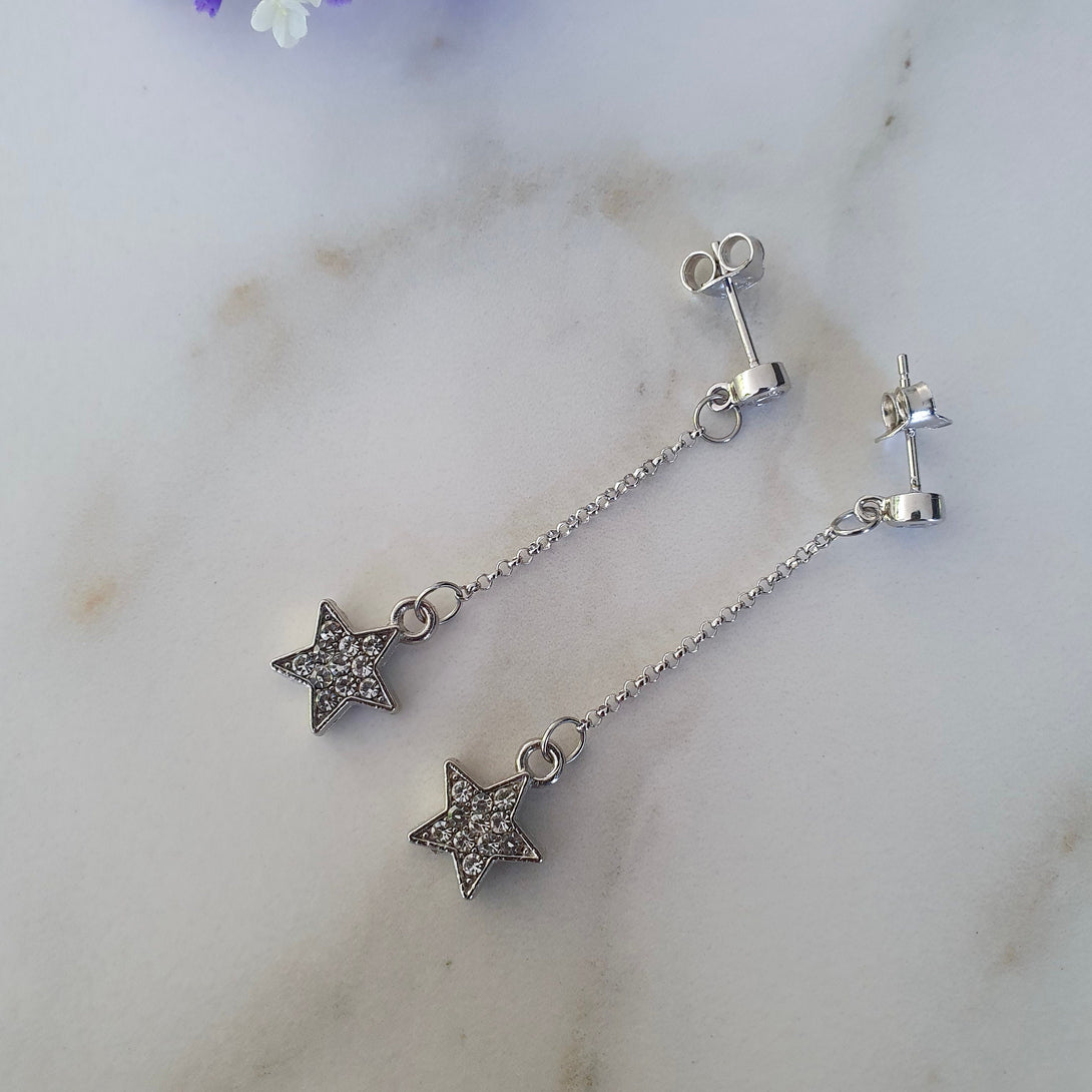 Sterling Silver Chain Drop Earrings With Star Charms, Symbolic Jewellery